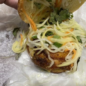 Hermosa - Cambodian Fried Chicken Sandwich w/Thai Basil, cilantro, green onions, julienne cut Papaya & carrots - Burgers Near Me - Chicago, Illinois Hermosa - Cambodian Fried Chicken Sandwich w/Thai Basil, cilantro, green onions, julienne cut Papaya & carrots - Burgers Near Me - Chicago, Illinois