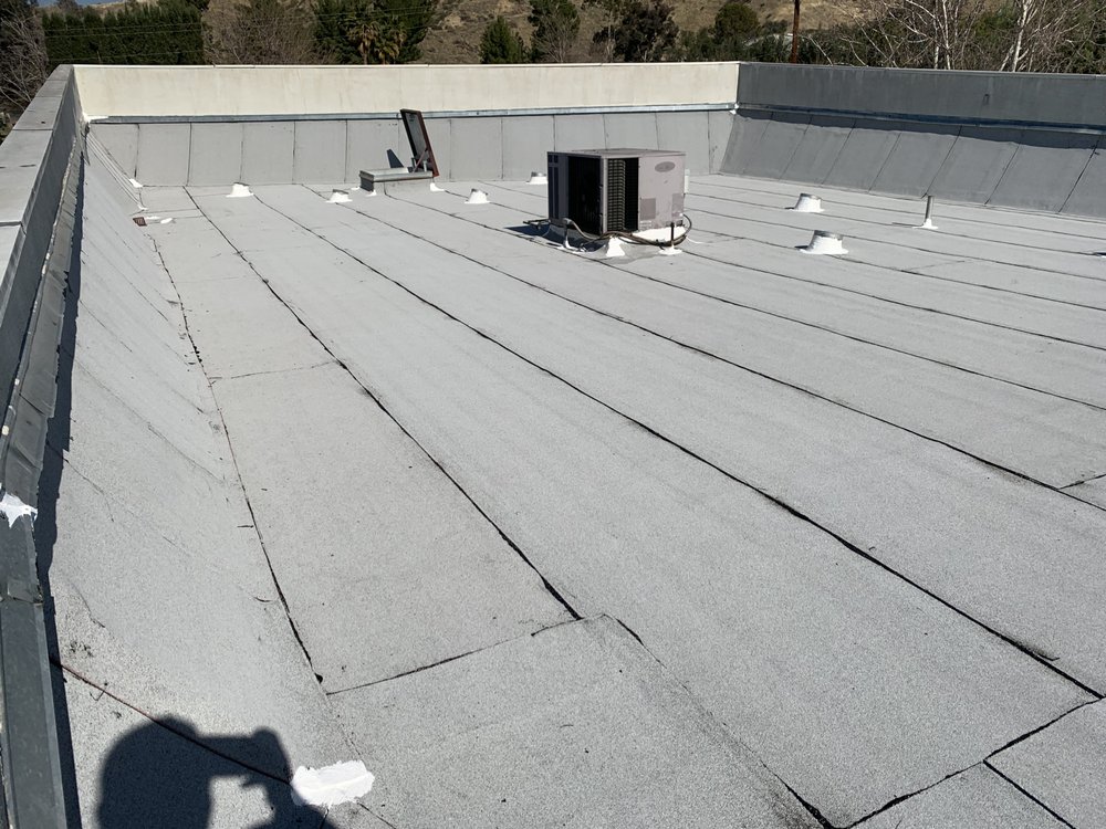 Slide of Espinal's Roofing & Waterproofing