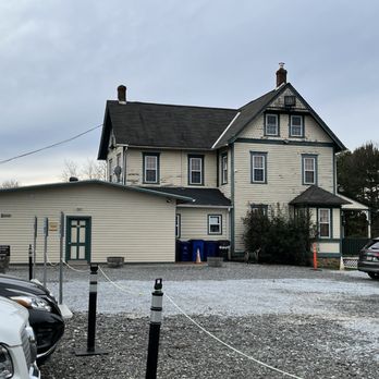Penns Woods Winery - a white house with a black roof - Wineries Near Me - Chadds Ford, Pennsylvania