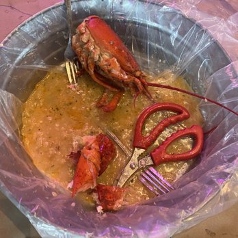 Cajun Boil - Lobster served in a bowl wrapped in plastic - Cajun/Creole Near Me - Miami, Florida