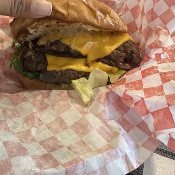 Illegal Burgers - The Snitch Burger with regular sized patty. - New American Near Me - Hayward, California Illegal Burgers - The Snitch Burger with regular sized patty. - New American Near Me - Hayward, California