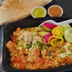 Falafel Kitchen - Shakshouka, sauces, and pita.