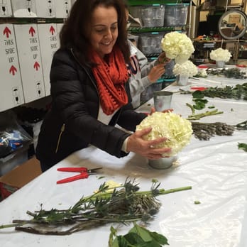 Flower Duet - Mama starting work on her "Winter Whites" centerpiece - Florists Near Me - Torrance, California Flower Duet - Mama starting work on her "Winter Whites" centerpiece - Florists Near Me - Torrance, California