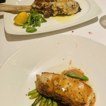 The Capital Grille - Parmesan Crusted Tomahawk Veal Chop and Seabass - Steakhouses Near Me - Plano, Texas The Capital Grille - Parmesan Crusted Tomahawk Veal Chop and Seabass - Steakhouses Near Me - Plano, Texas