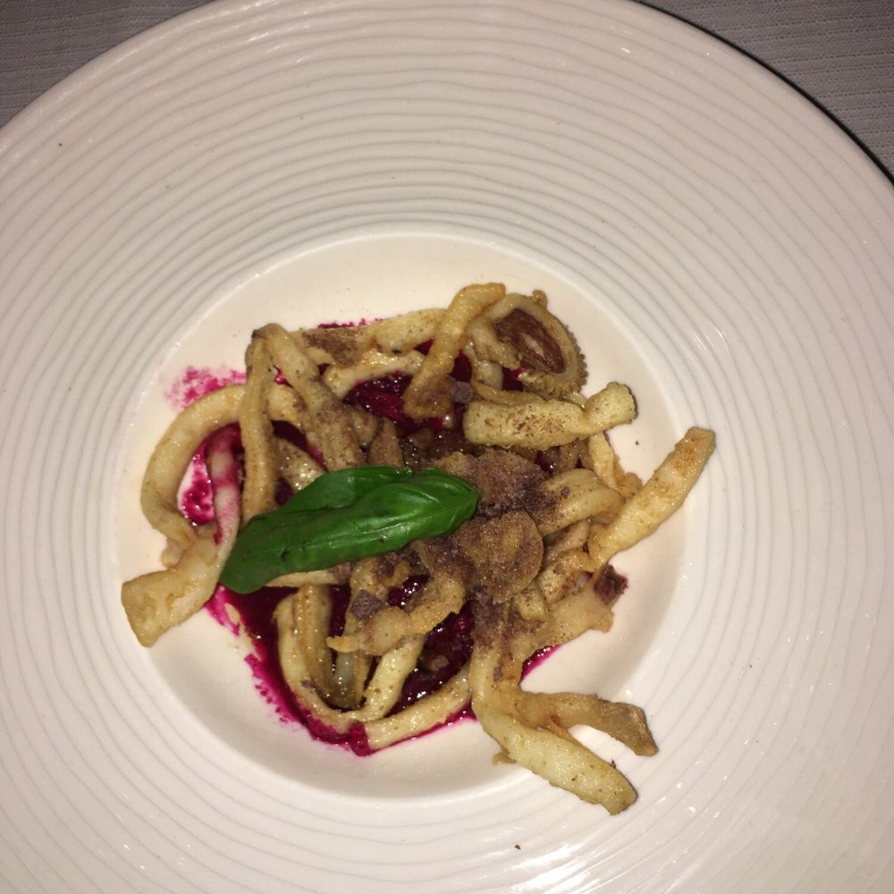 1/4 sampler dinner. The starter was good calamari over a purée of beets. It was okay.