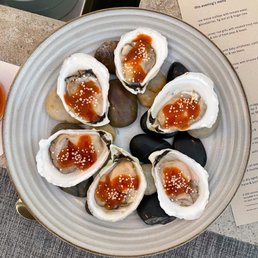 Oysters with strawberry gochujang, blood orange & masago