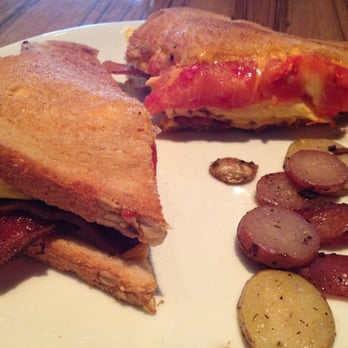 Cosmos - Egg sandwich with tomato and bacon - New American Near Me - Minneapolis, Minnesota Cosmos - Egg sandwich with tomato and bacon - New American Near Me - Minneapolis, Minnesota