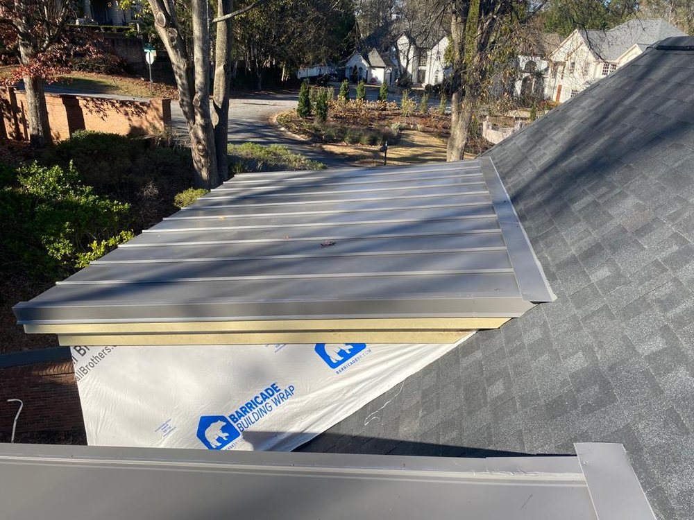 Slide of J Juarez Roofing