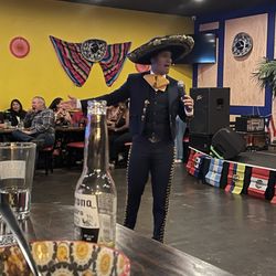 Casa Amigos Cantina - Singer in front of the stage.