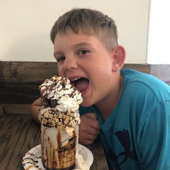 The Yard Milkshake Bar - Turtle milkshake (he might've finished 1/2) - Ice Cream & Frozen Yogurt Near Me - Gulf Shores, Alabama The Yard Milkshake Bar - Turtle milkshake (he might've finished 1/2) - Ice Cream & Frozen Yogurt Near Me - Gulf Shores, Alabama
