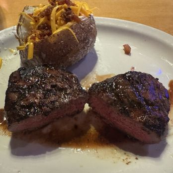 Texas Roadhouse - 8 ounce sirloin steak - thick cut - cooked medium with a loaded baked potato - Steakhouses Near Me - Eugene, Oregon