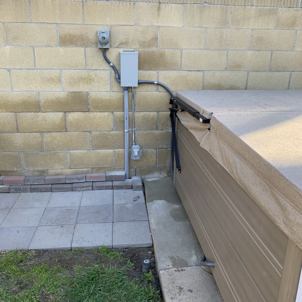 Fullerton Electric - Final placement of 240V spa sub panel, 240V generator port and wired jacuzzi. - Electricians Near Me - Fullerton, California