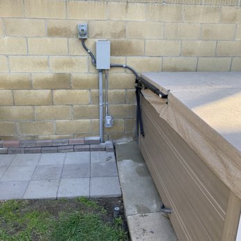 Fullerton Electric - Final placement of 240V spa sub panel, 240V generator port and wired jacuzzi. - Electricians Near Me - Fullerton, California