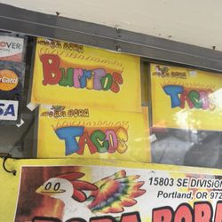 Bora Bora Taqueria - Colorful signs about the menu.