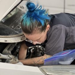 Mechanic Emily working hard at getting our customers back on the road !