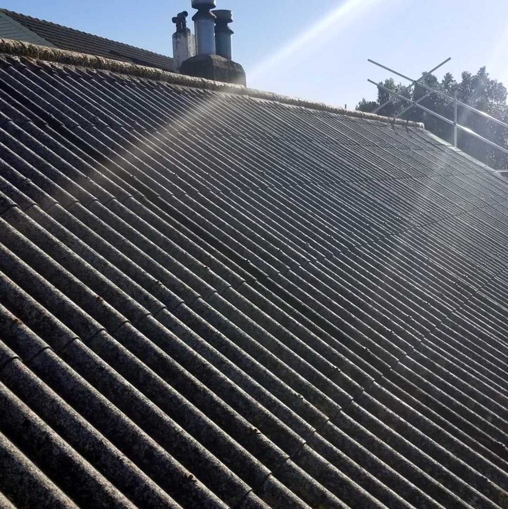 Slide of Liberty City Roofing