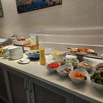The Club CHS - Self serve area - salads, fruit, dips etc. - Airport Lounges Near Me - Charleston, South Carolina