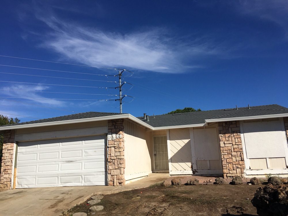 Slide of Aztec Roofing