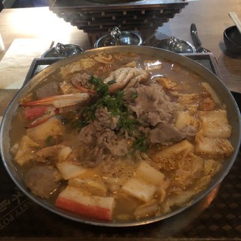 Tasty Pot - Thai Flavor Hot Soup and Curry Soup in the background - Hot Pot Near Me - Aurora, Colorado Tasty Pot - Thai Flavor Hot Soup and Curry Soup in the background - Hot Pot Near Me - Aurora, Colorado