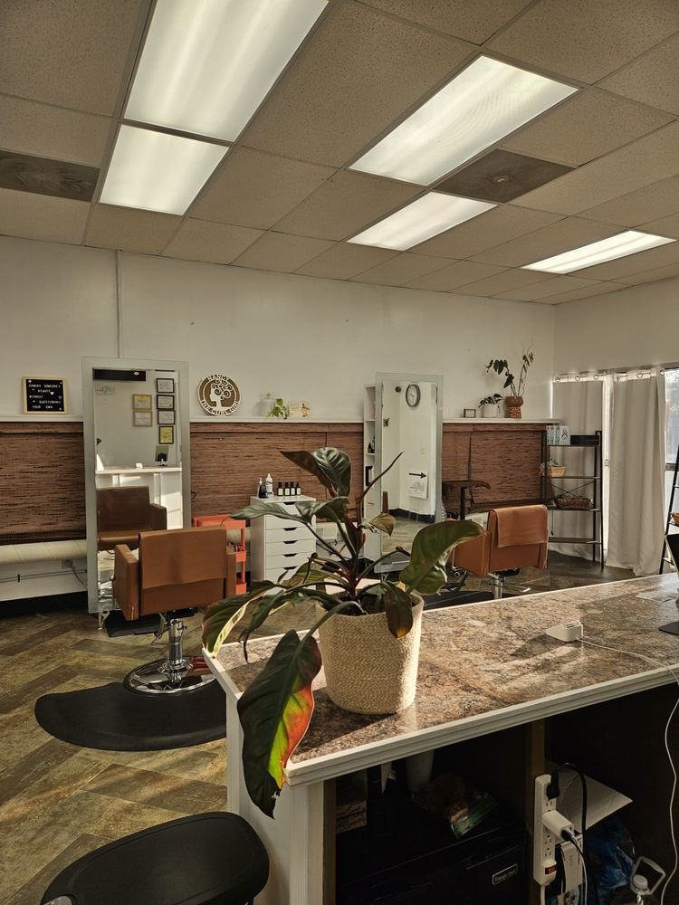 Wholeness Hair Clinic Logo