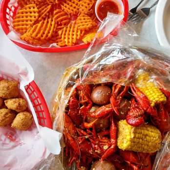 Juicy Seafood - 2 lbs of Crawfish, potatoes, and corn - Seafood Near Me - Rochester, New York Juicy Seafood - 2 lbs of Crawfish, potatoes, and corn - Seafood Near Me - Rochester, New York