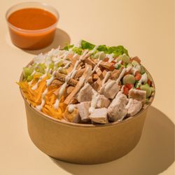 Fresh Greens and Proteins - Bobcat bowl
Basmati, white rice, grilled chicken, Celery, pico de gallo, Shredded Romaine, Scallions, shredded cheddar, tortilla chips