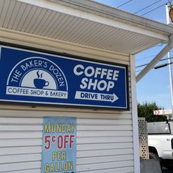 Baker's Dozen - Norwich - Sign on the side of the Mobil gas station store