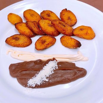 La Pachanga - a plate of food with bananas and chocolate - Food Trucks Near Me La Pachanga - a plate of food with bananas and chocolate - Food Trucks Near Me