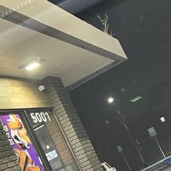 Dirty drive through, needs a power wash and windows cleaned along with the weeds being removed from the roof. No pride in ownership.