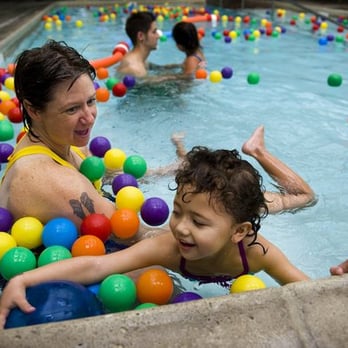 Ralph Richardson Center - Instructional assistant Elly Baraga works on with Brooke Galicinao, 4, in the pool at Ralph Richardson Center. - Special Education Near Me - Carmichael, California Ralph Richardson Center - Instructional assistant Elly Baraga works on with Brooke Galicinao, 4, in the pool at Ralph Richardson Center. - Special Education Near Me - Carmichael, California