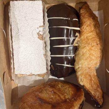 Versailles - To go order - pastelito de queso, pastelito de carne, senorita, and eclair - Cuban Near Me - Miami, Florida