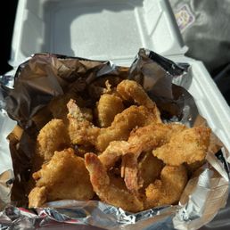 10 piece fried Cajun shrimp with 2 hush puppies. 10 piece fried Cajun shrimp with 2 hush puppies.