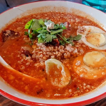Klom Klorm - Gauy Tiew Tom Yum (Tom yum noodle soup with rice noodles, ground pork, cilantro, egg, peanut, pork ball and bean sprouts) - Thai Near Me - Brooklyn, New York