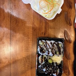 Yummy Sushi & Steak House - Eel and cucumber roll, salad
