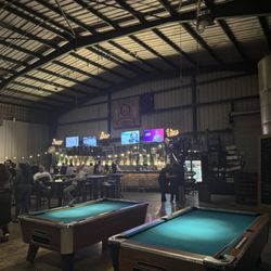 Miami Brewing Company - Bar area with pool tables. Games run on quarters, so bring $1 and $5 cash for change machine.