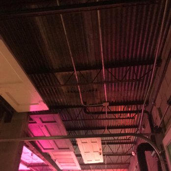 Still Spirits - No lighting in back area of bar but ambiance is dim through rest of bar - Distilleries Near Me - Albuquerque, New Mexico