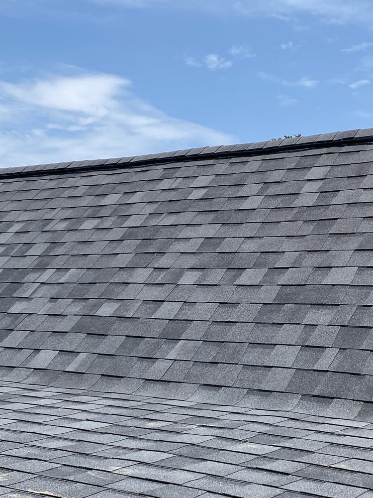 Slide of Ruebens Roofing