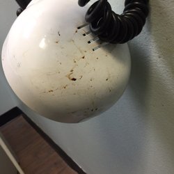 Marchand & Associates Family Medicine - Old blood on a lamp in the exam room