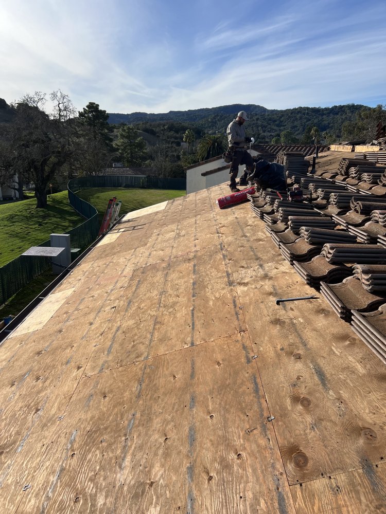 Slide of King roofing company