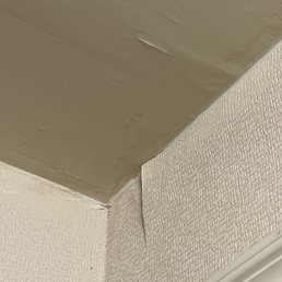 Peeling wallpaper and lumpy ceiling paint in bathroom Peeling wallpaper and lumpy ceiling paint in bathroom