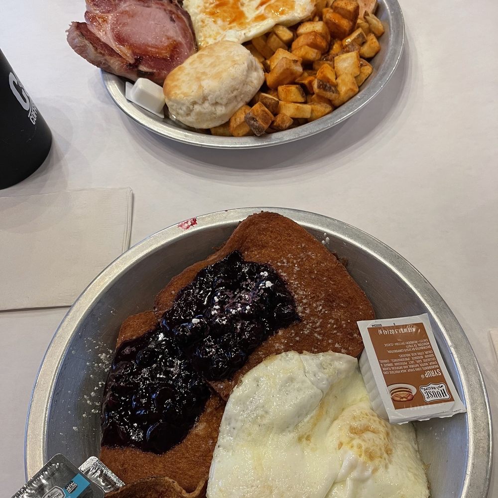 J DUB - Blueberry French Toast with eggs over medium and side of bacon. Smoked Pork Chop with biscuit, eggs, and potatoes. - Breakfast & Brunch Near Me - Bend, Oregon J DUB - Blueberry French Toast with eggs over medium and side of bacon. Smoked Pork Chop with biscuit, eggs, and potatoes. - Breakfast & Brunch Near Me - Bend, Oregon