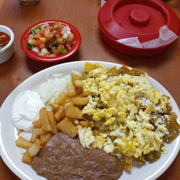 Chilaquiles with salsa verde and pico de gallo Chilaquiles with salsa verde and pico de gallo