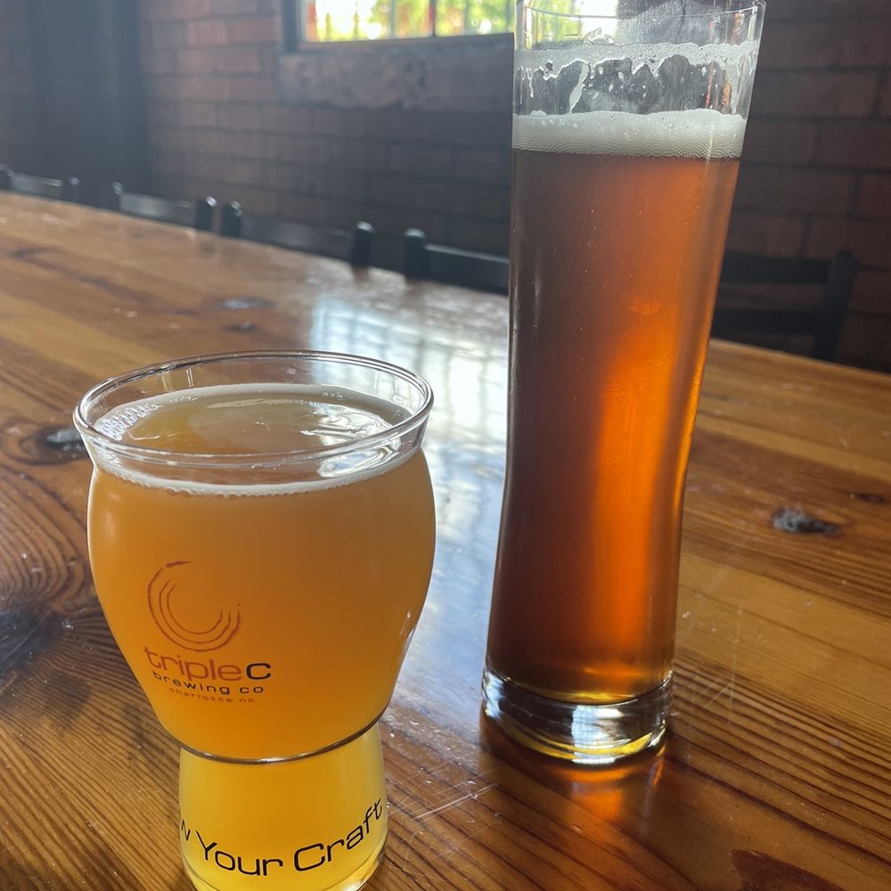 Triple C Brewing Company - Citrus Acid test (left) & Oktoberfest. Both amazing! - Breweries Near Me - Charlotte, North Carolina Triple C Brewing Company - Citrus Acid test (left) & Oktoberfest. Both amazing! - Breweries Near Me - Charlotte, North Carolina