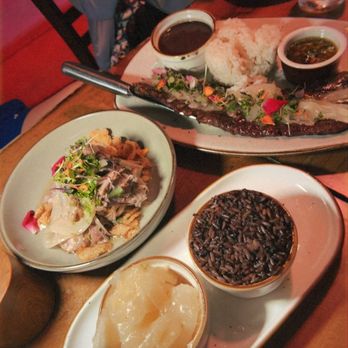 La Mulata - Roasted Pork Cuban Style (Lechon Asado a la Guajira) + Angus Skirt Steak (Churrasco Encebollado a la Casera) - Cuban Near Me - Miami Beach, Florida La Mulata - Roasted Pork Cuban Style (Lechon Asado a la Guajira) + Angus Skirt Steak (Churrasco Encebollado a la Casera) - Cuban Near Me - Miami Beach, Florida