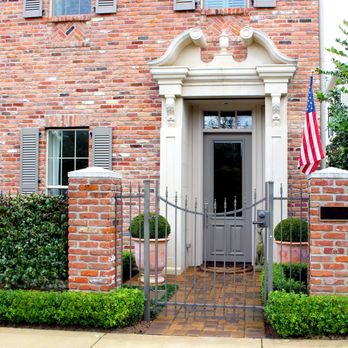 Moss Landscaping - Loving the simple elegance of this client's entrance in East Shore. Also, the swan's neck pediment door is stunning. - Tree Services Near Me - Houston, Texas