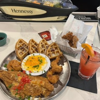 T's Brunch Bar - The Marta with a side of whole wings and a Rum Punch - Breakfast & Brunch Near Me - Atlanta, Georgia T's Brunch Bar - The Marta with a side of whole wings and a Rum Punch - Breakfast & Brunch Near Me - Atlanta, Georgia