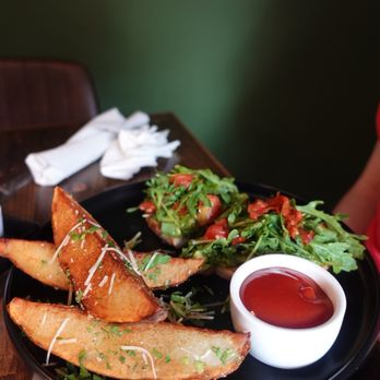 The Pop Spot Bar and Grill - Avocado toast and Parmesan wedges - Salad Near Me - Memphis, Tennessee The Pop Spot Bar and Grill - Avocado toast and Parmesan wedges - Salad Near Me - Memphis, Tennessee