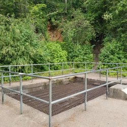 Franklin Ghost Town - Mine shaft is covered in a grate and fenced for your safety.