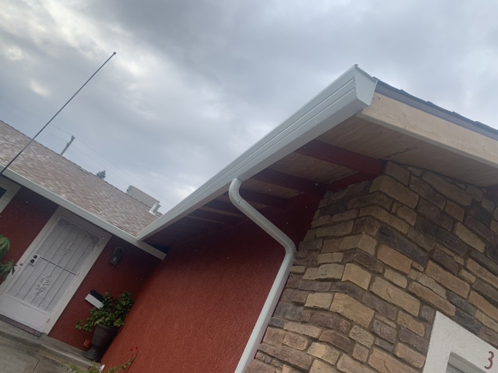 Slide of ML Gutters & Roofing