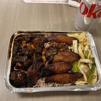 The Original Caribbean King - Oxtail Bowl with Coconut Rice - Food Trucks Near Me - Brooklyn, New York The Original Caribbean King - Oxtail Bowl with Coconut Rice - Food Trucks Near Me - Brooklyn, New York